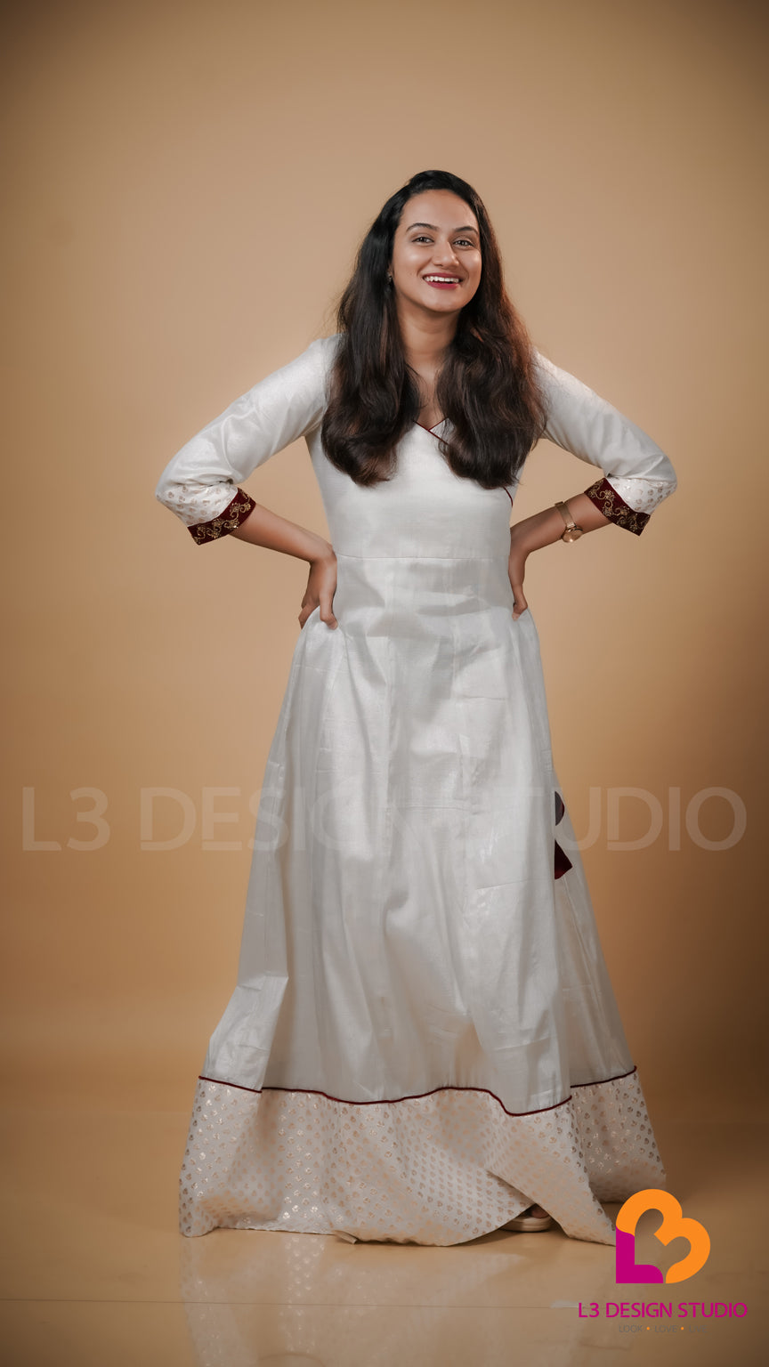 Silver Tissue Onam Dress with Maroon Velvet Accents