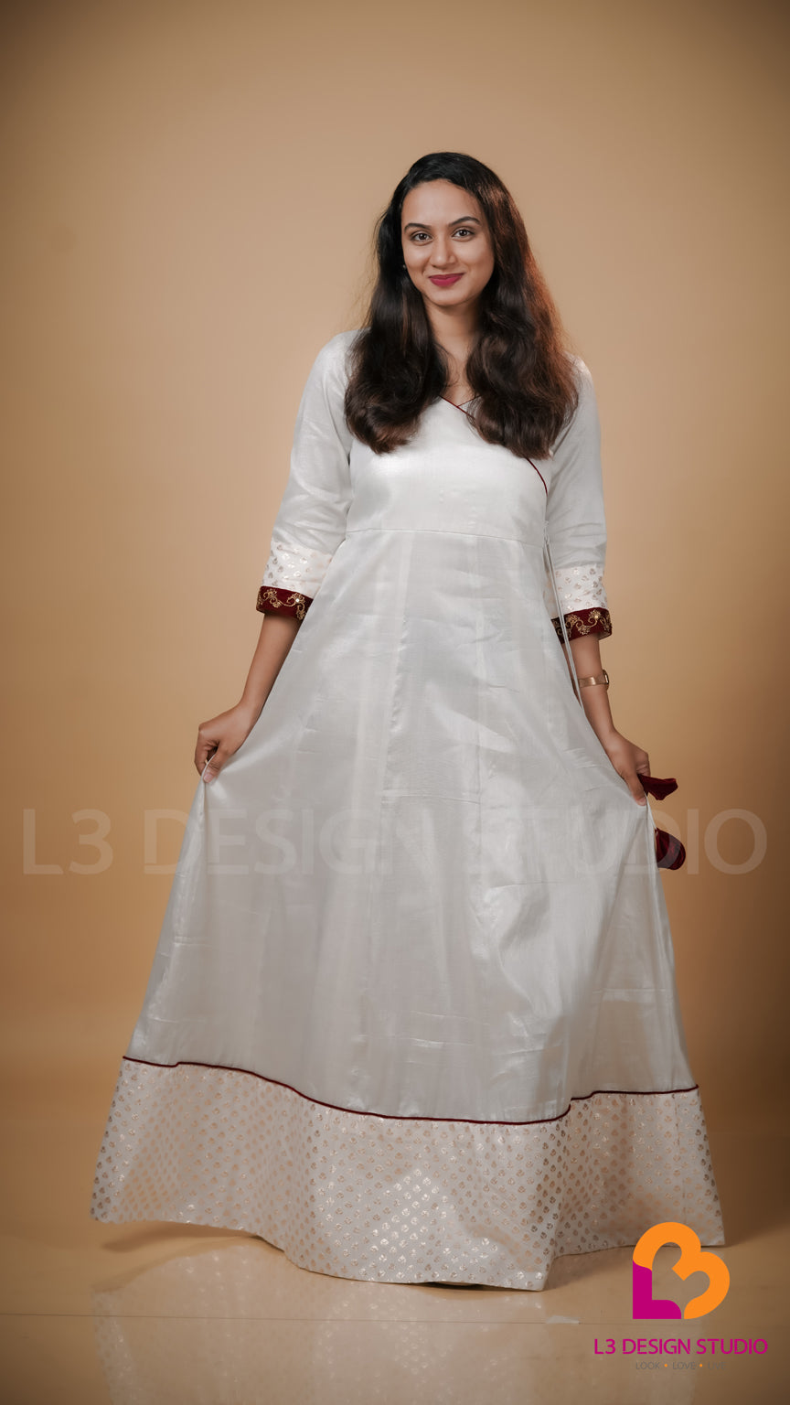 Silver Tissue Onam Dress with Maroon Velvet Accents