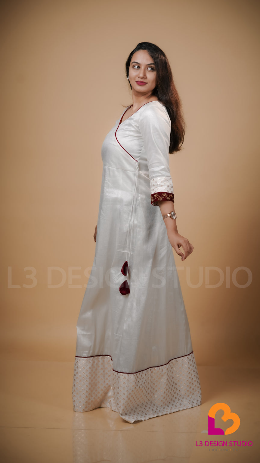 Silver Tissue Onam Dress with Maroon Velvet Accents