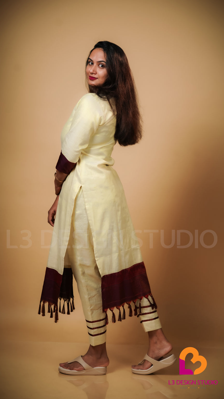 Golden Tissue Onam Kurti with Brown Designer Fabric and Tassels