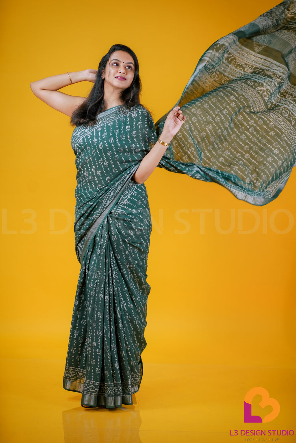 Bottle Green Linen Cotton Saree with Silver Zari and Printed Pallu