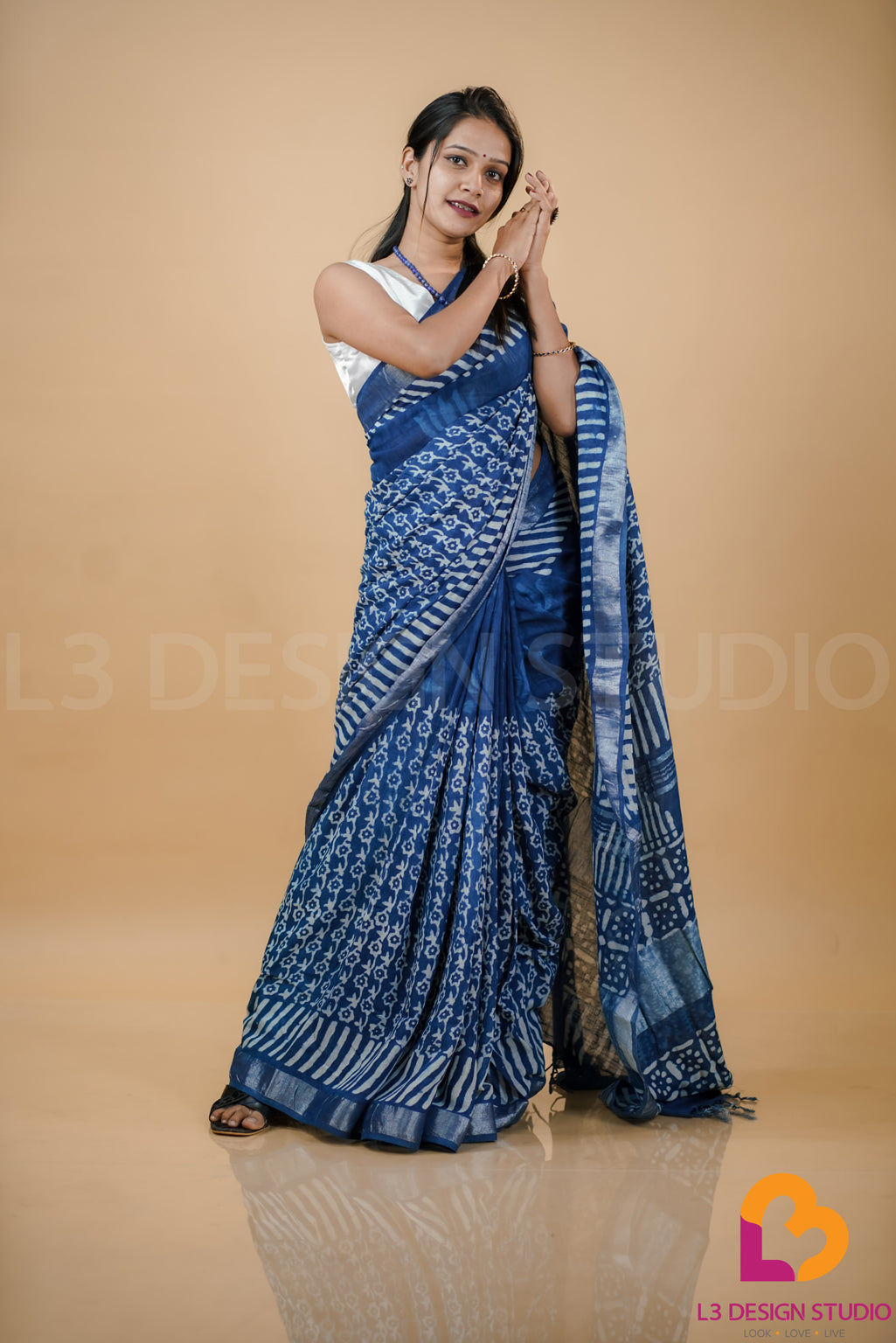 Indigo Linen Cotton Saree with Intricate Printed Designs and Silver Zari Accents