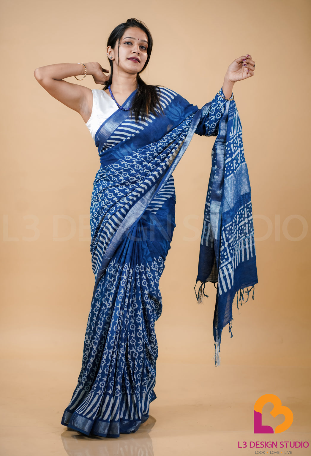 Indigo Linen Cotton Saree with Intricate Printed Designs and Silver Zari Accents