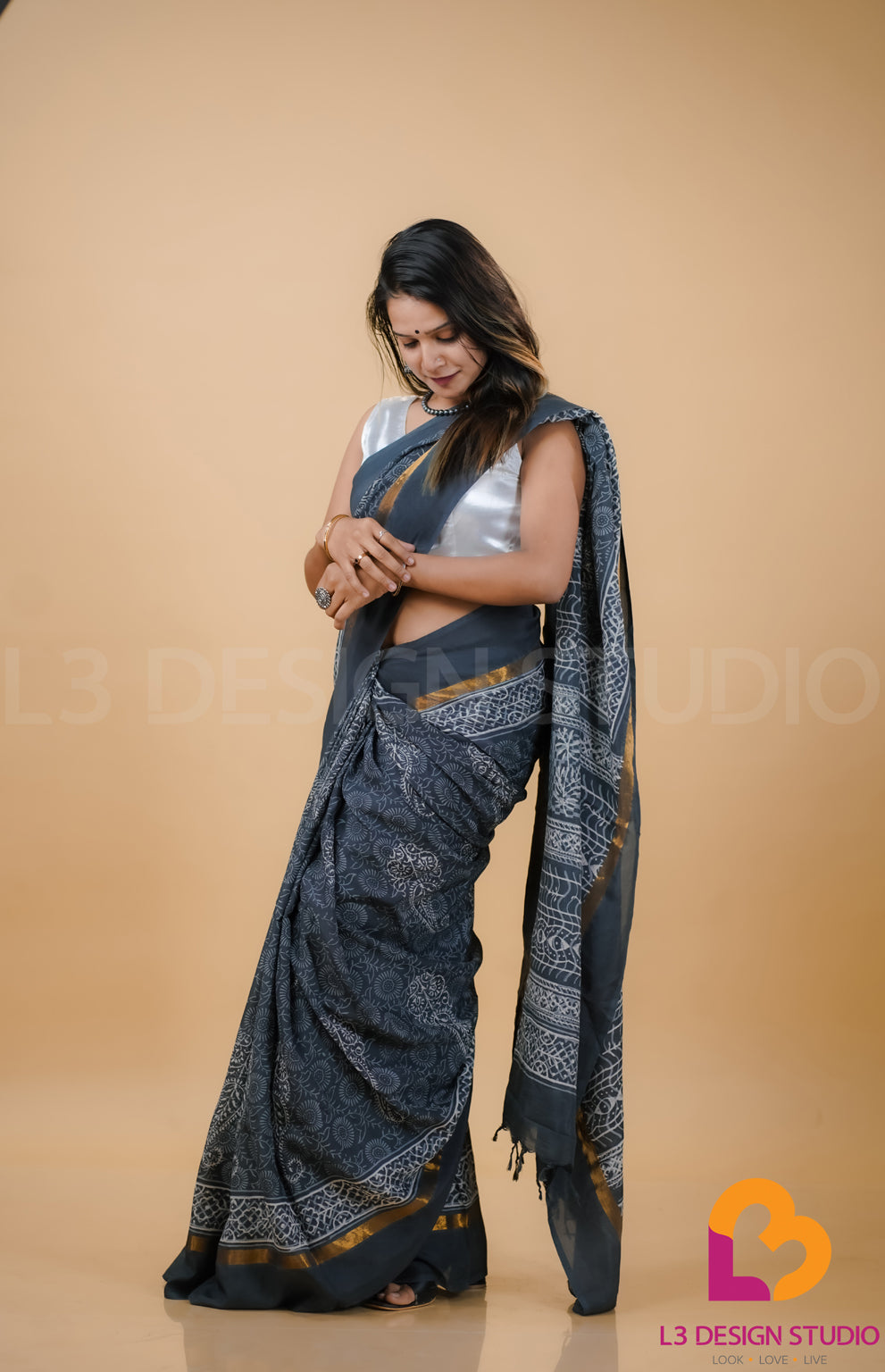 Grey Assam Silk Saree with Intricate Printing and Gold Zari Border