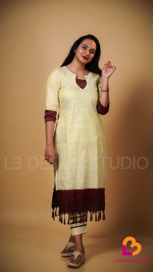 Golden Tissue Onam Kurti with Brown Designer Fabric and Tassels