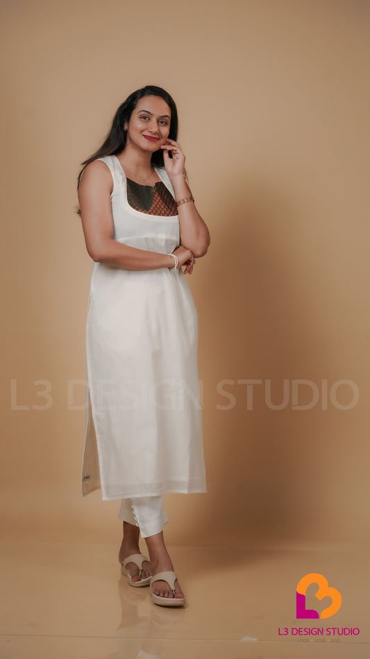 Off White Cotton Sleeveless Kurti with Golden and Dark Green Brocade Yoke