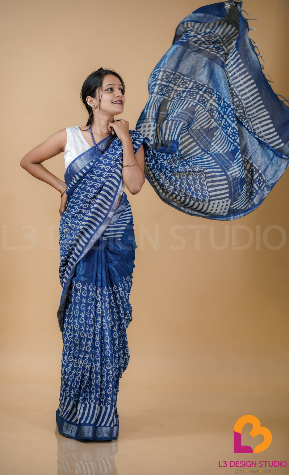 Indigo Linen Cotton Saree with Intricate Printed Designs and Silver Zari Accents