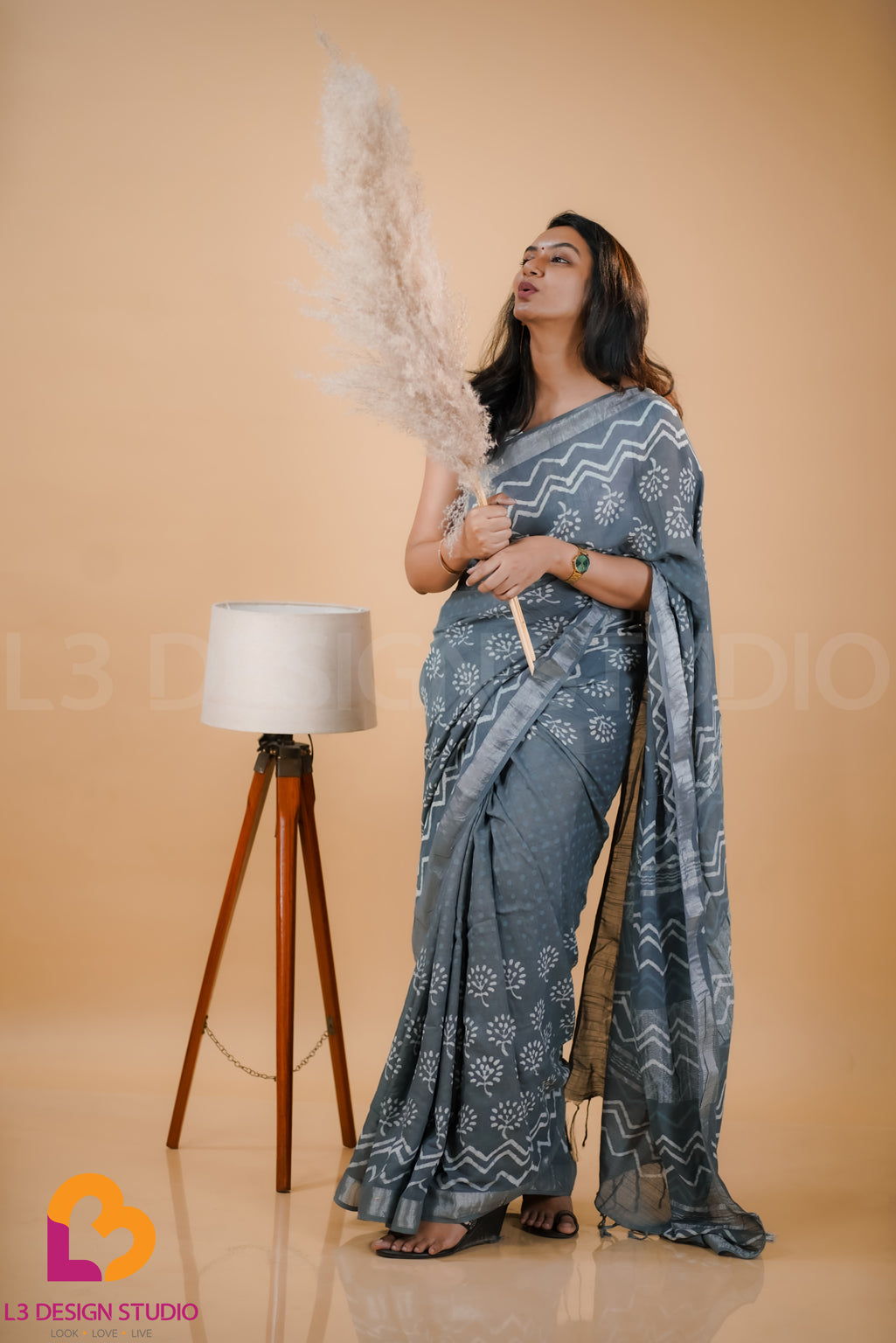 Grey Linen Cotton Saree with Delicate Dotted Patterns and Silver Zari Accents