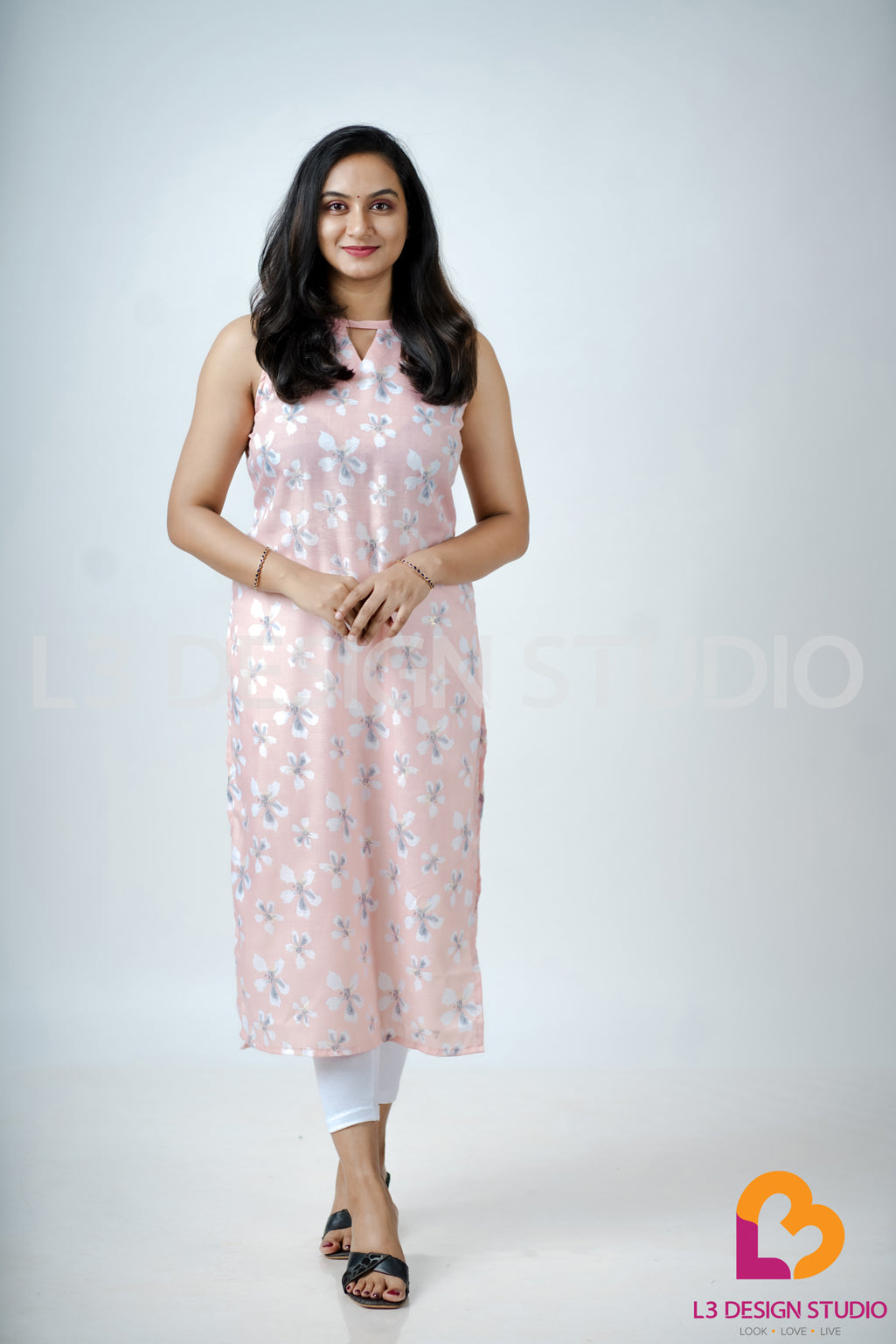 Pastel Peach Foil Printed Sleeveless Kurti